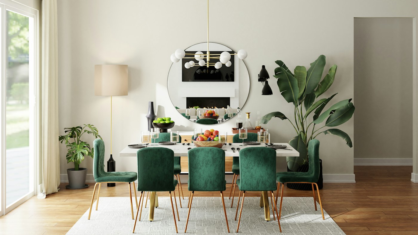 Dining table, green chairs and plants in a welcoming home